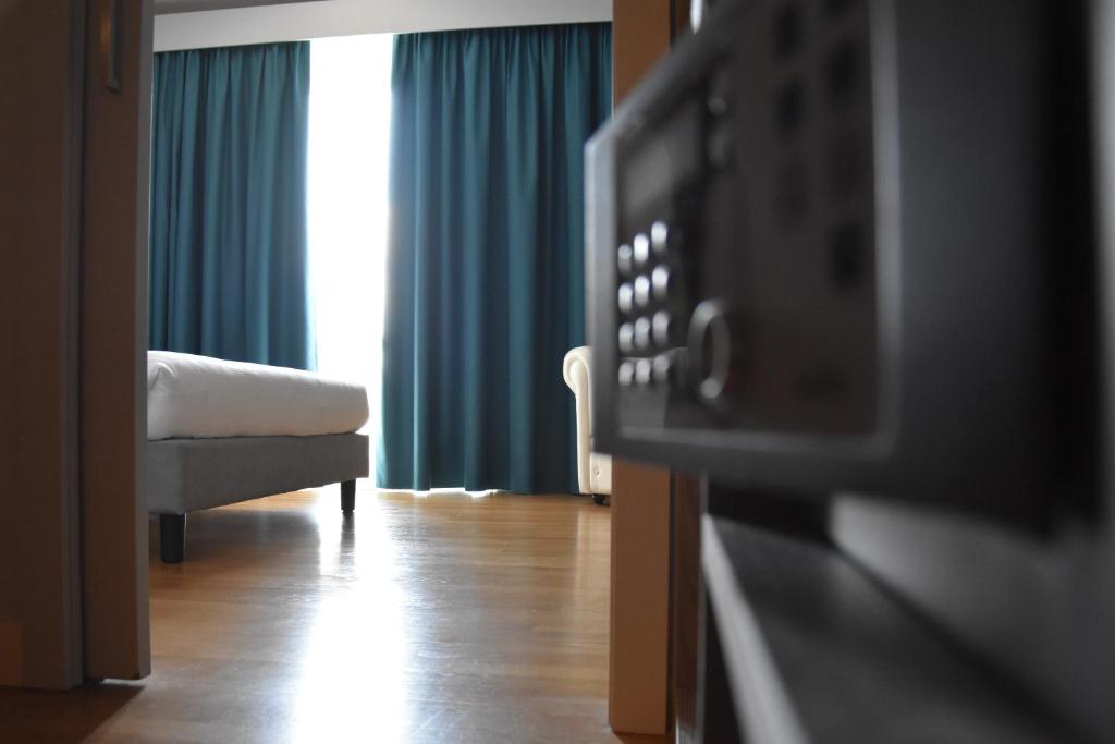 TV a/nebo společenská místnost v ubytování Hotel Motel Prestige