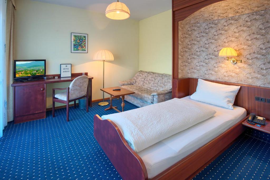 Postel nebo postele na pokoji v ubytování Hotel Bären