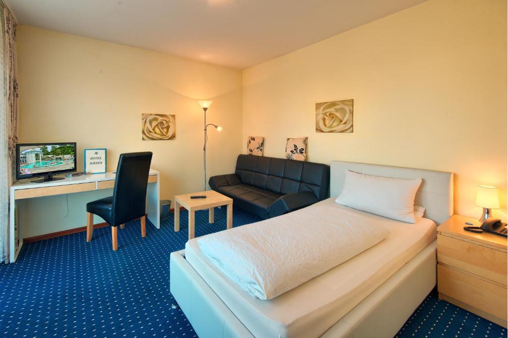 Postel nebo postele na pokoji v ubytování Hotel Bären