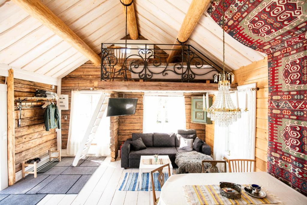 TV a/nebo společenská místnost v ubytování Hugsnäset Semesterstugor och Fiske