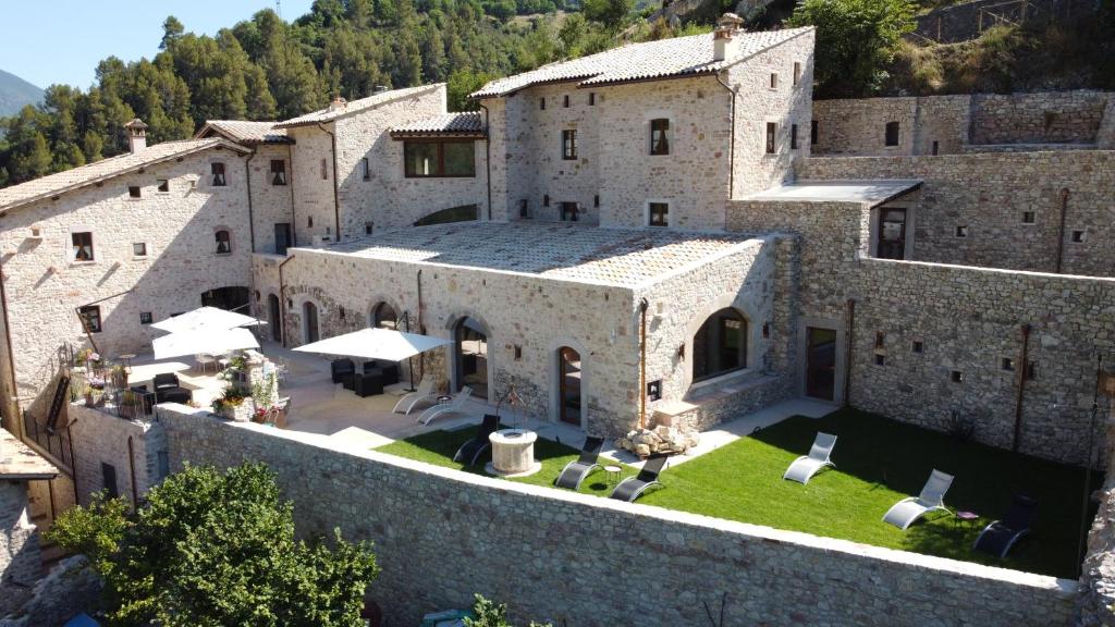 an aerial view of a large stone building at Torre Del Nera Albergo diffuso & Spa in Scheggino