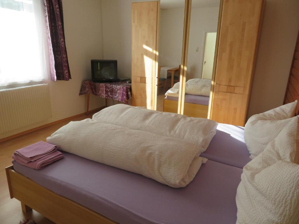 Postel nebo postele na pokoji v ubytování Haus Irmi