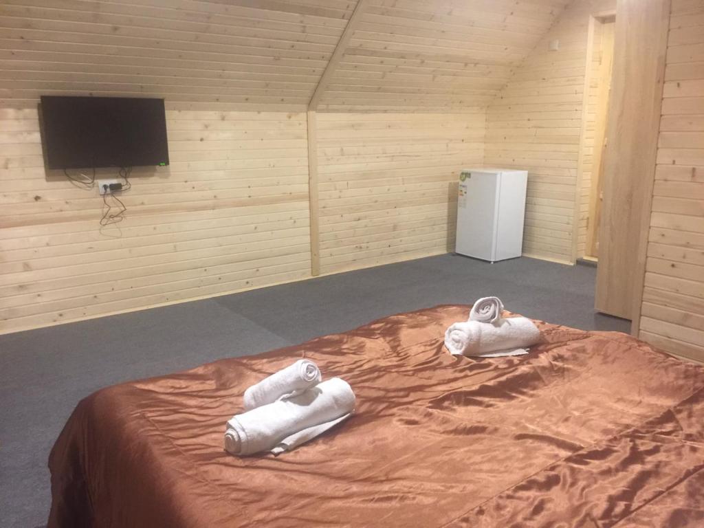 Postel nebo postele na pokoji v ubytování Вилла Zlata