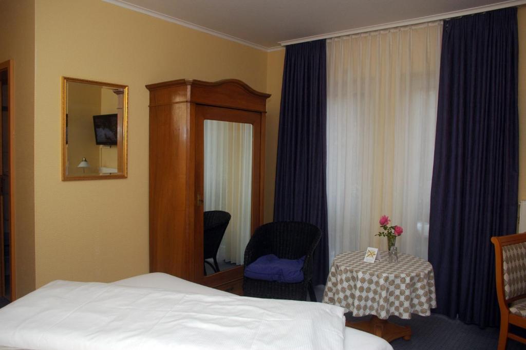 Postel nebo postele na pokoji v ubytování Hotel Lindemann
