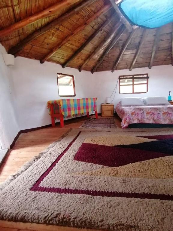 Postel nebo postele na pokoji v ubytování Jardin Colibri RNT 33633