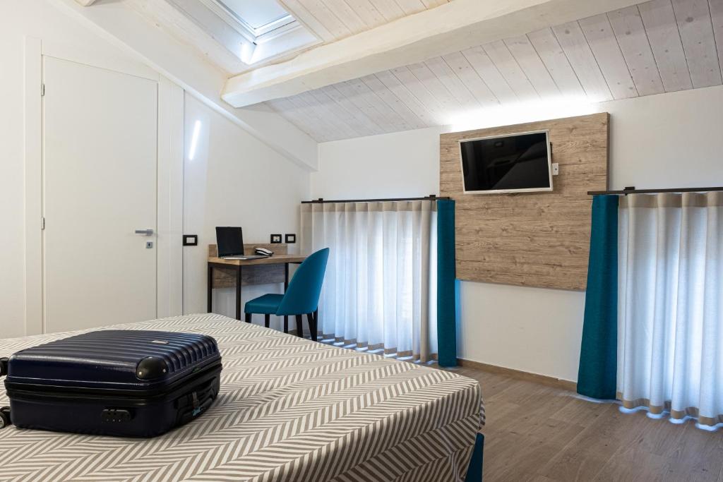 TV a/nebo společenská místnost v ubytování Cuneo Hotel
