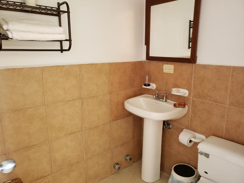 Koupelna v ubytování Arco Iris Atacames