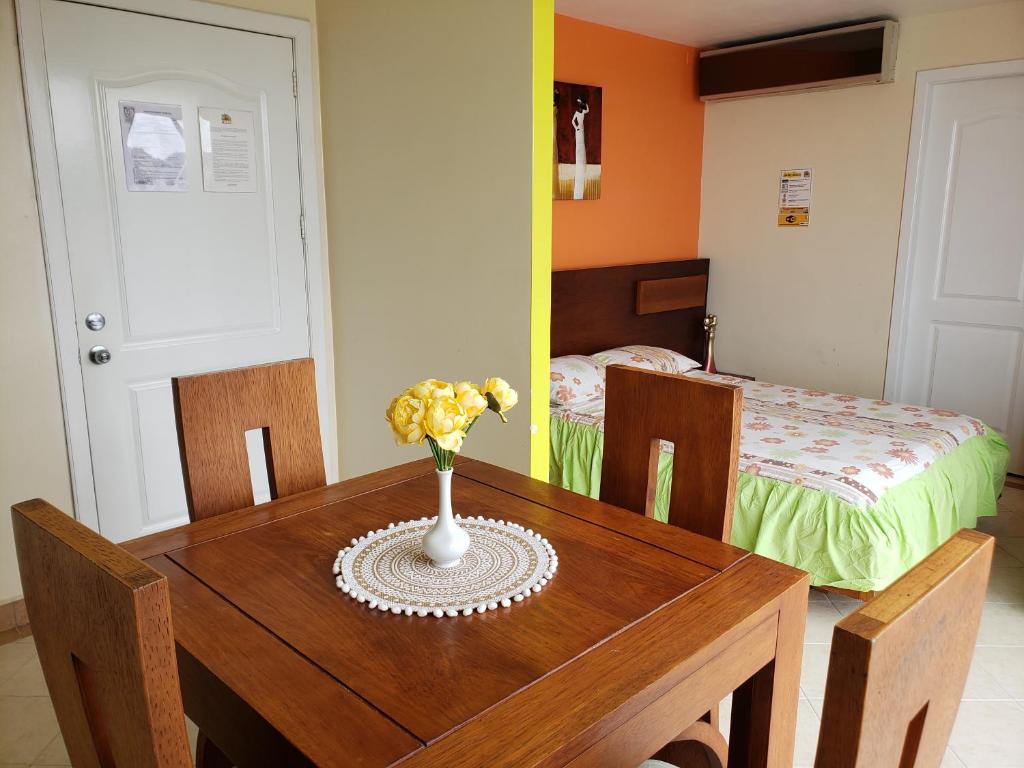 Postel nebo postele na pokoji v ubytování Arco Iris Atacames