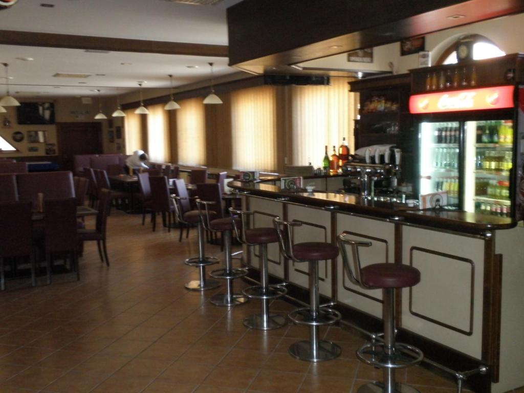 Lounge nebo bar v ubytování Hotel Le Café