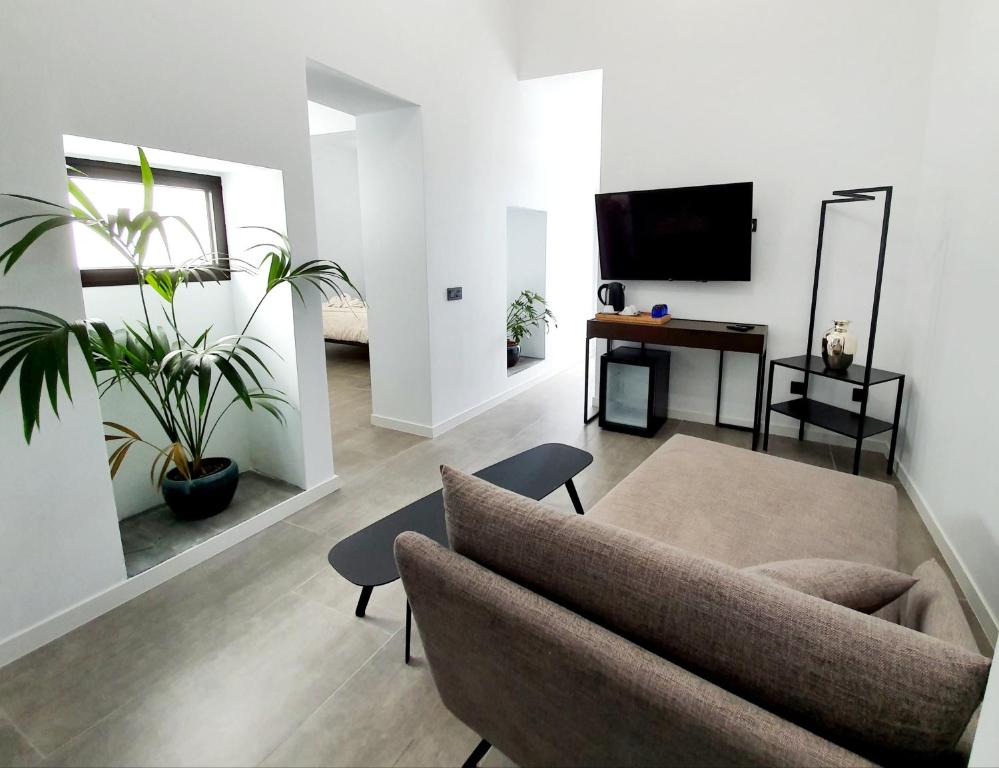 TV a/nebo společenská místnost v ubytování Mana EcoRetreat