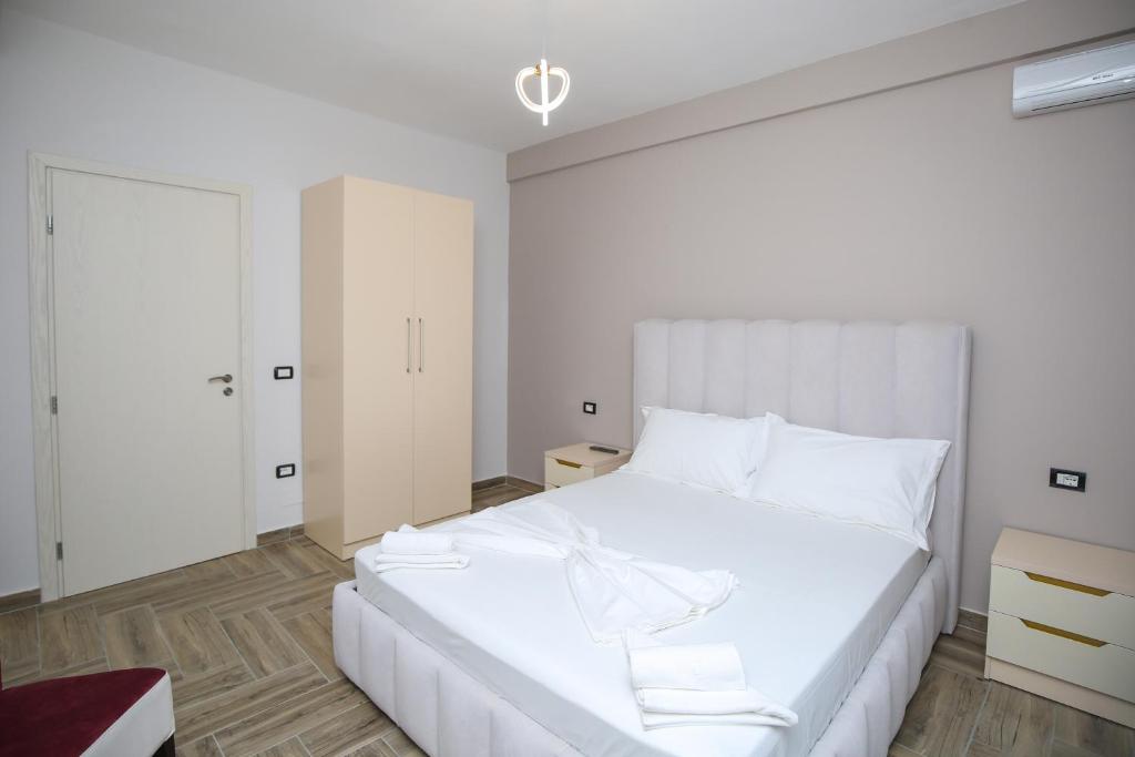 Postel nebo postele na pokoji v ubytování Hotel Vila Stefa