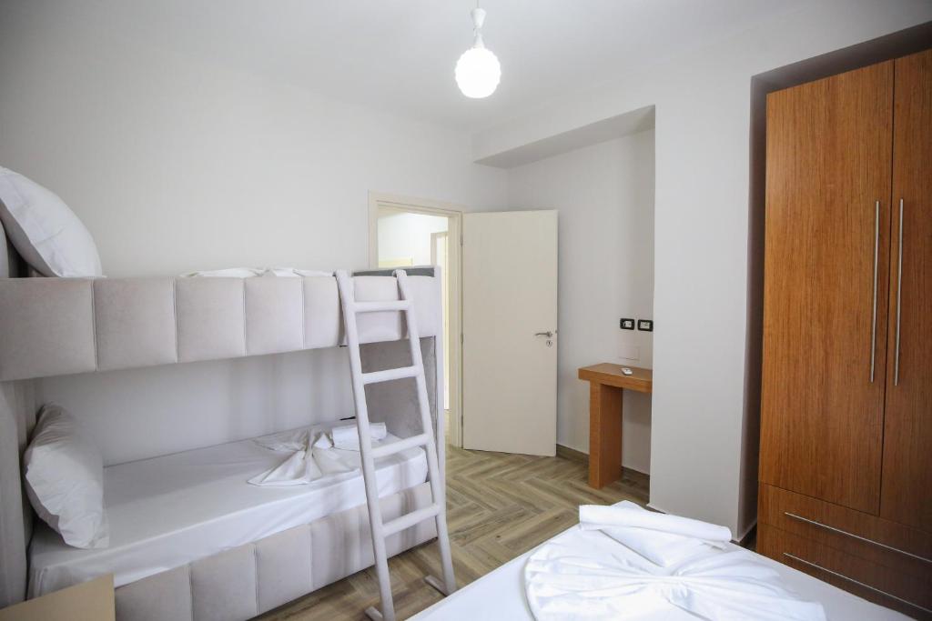 Postel nebo postele na pokoji v ubytování Hotel Vila Stefa