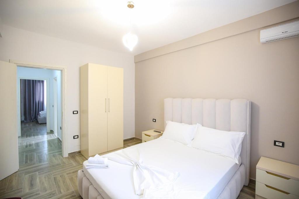 Postel nebo postele na pokoji v ubytování Hotel Vila Stefa