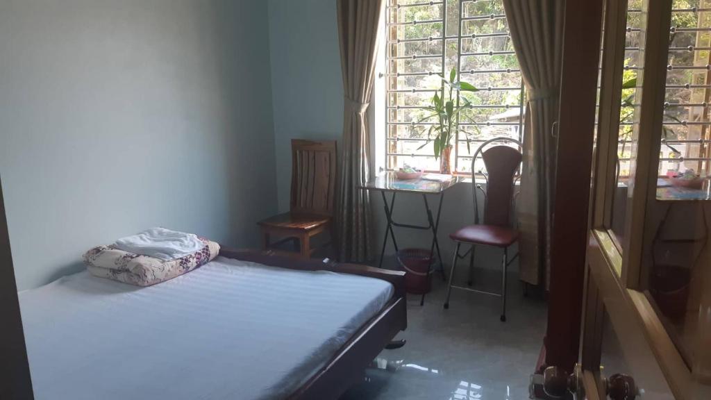 Postel nebo postele na pokoji v ubytování Hải Phận Homestay
