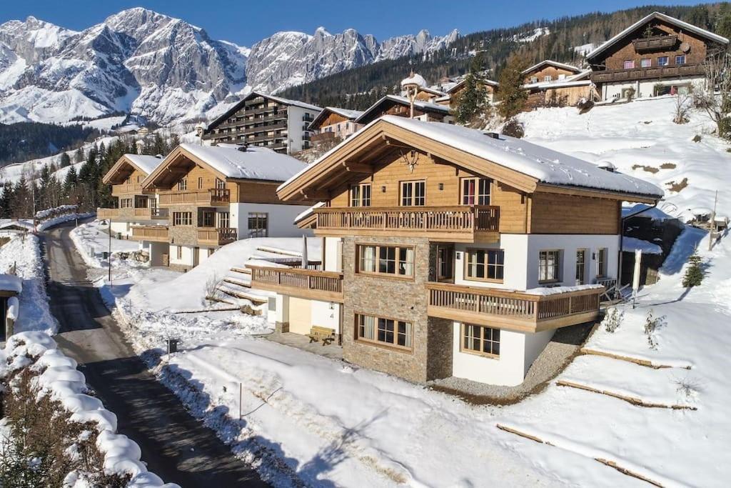 an aerial view of a house in the snow at Königshaus by Alpin Bookings in Mühlbach am Hochkönig