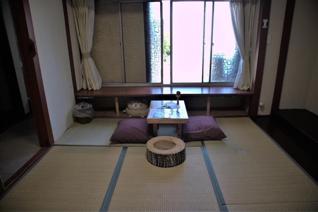 Posezení v ubytování Hana Hostel Fujisan