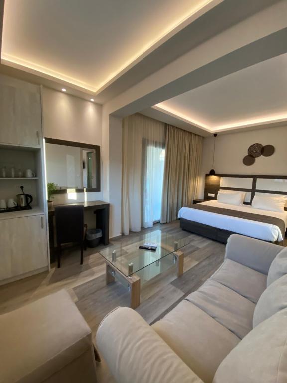 Postel nebo postele na pokoji v ubytování ABATON Luxury Resort
