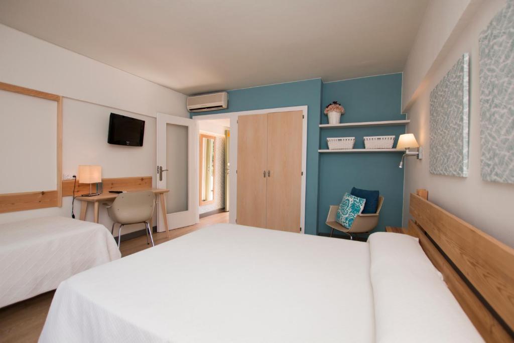 Postel nebo postele na pokoji v ubytování Hotel Yola