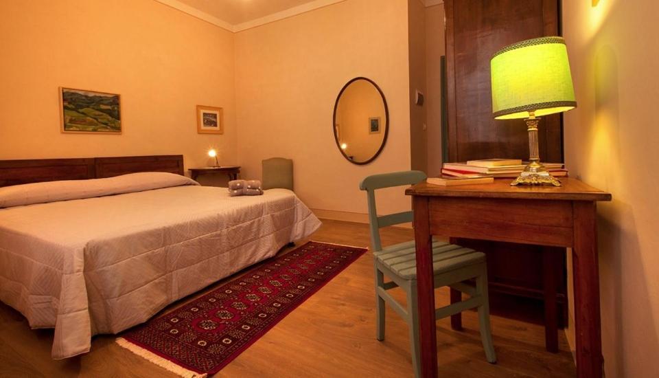 Postel nebo postele na pokoji v ubytování Agriturismo Minaldo