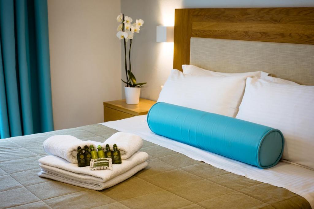 Postel nebo postele na pokoji v ubytování Aktaia Boutique Hotel