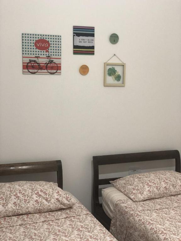 Postel nebo postele na pokoji v ubytování Pousada Romã