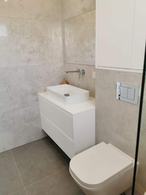 Kúpeľňa v ubytovaní Sun House - Domy Mazur