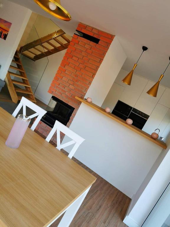 Kuchyňa alebo kuchynka v ubytovaní Sun House - Domy Mazur