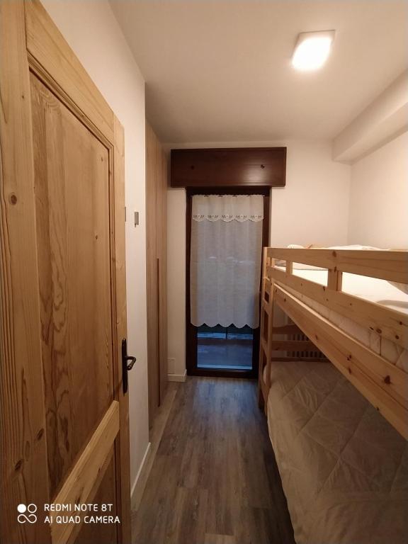 Postel nebo postele na pokoji v ubytování Solimmo