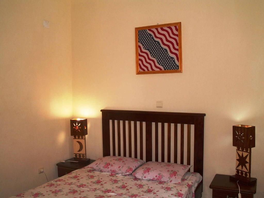 Postel nebo postele na pokoji v ubytování Edificio Magico