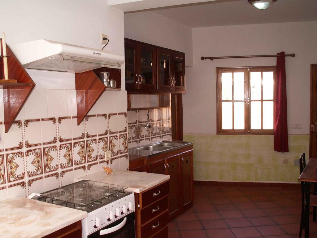 Kuchyň nebo kuchyňský kout v ubytování Edificio Magico