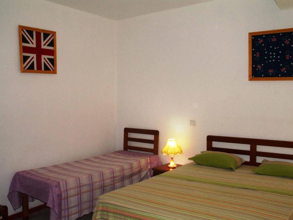 Postel nebo postele na pokoji v ubytování Edificio Magico