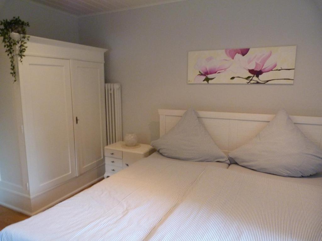Postel nebo postele na pokoji v ubytování Gästezimmer Am Hüstert