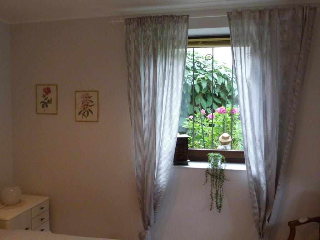 Postel nebo postele na pokoji v ubytování Gästezimmer Am Hüstert