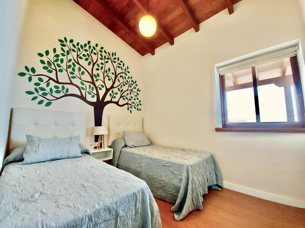 Postel nebo postele na pokoji v ubytování Papaya Paradise