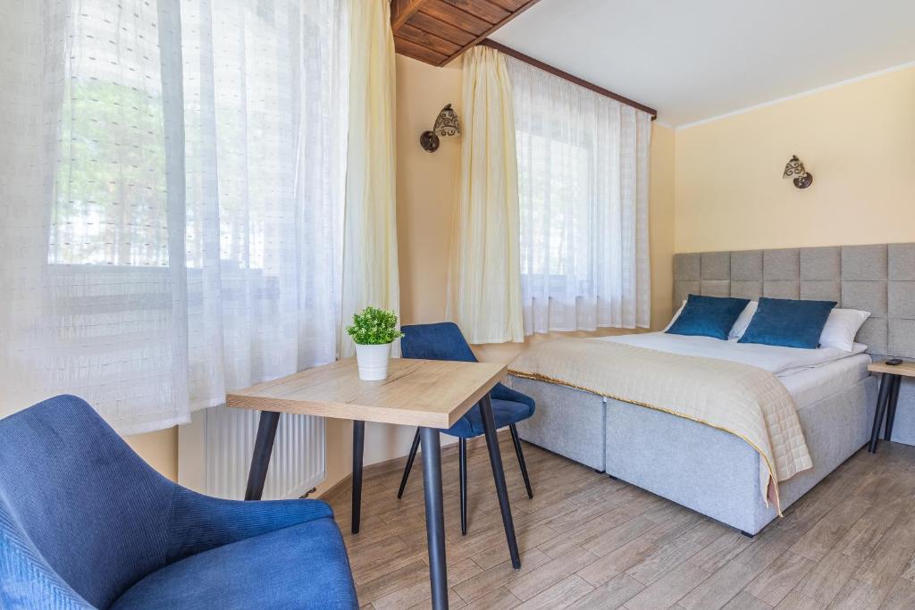 Postel nebo postele na pokoji v ubytování Mewa