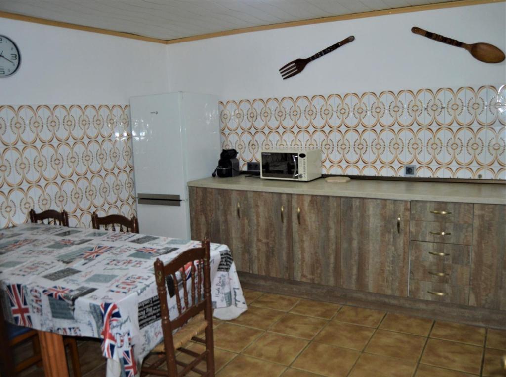 Kuchyň nebo kuchyňský kout v ubytování Casa Rural Consuelo