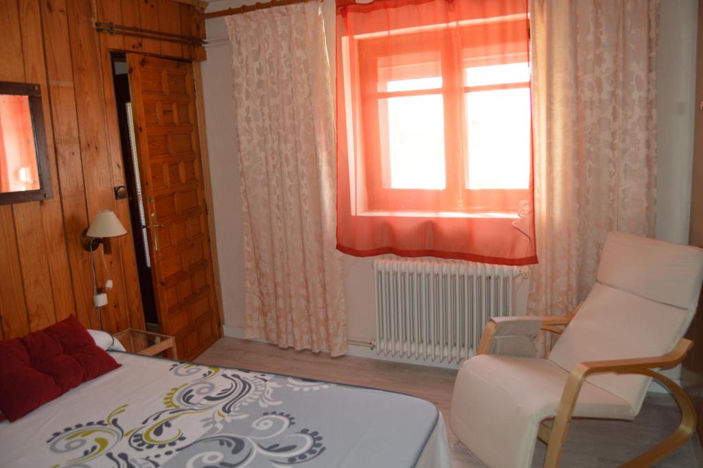 Postel nebo postele na pokoji v ubytování Casa Rural Consuelo