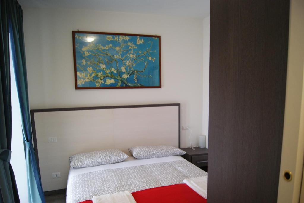 Postel nebo postele na pokoji v ubytování Colle Sul Lago