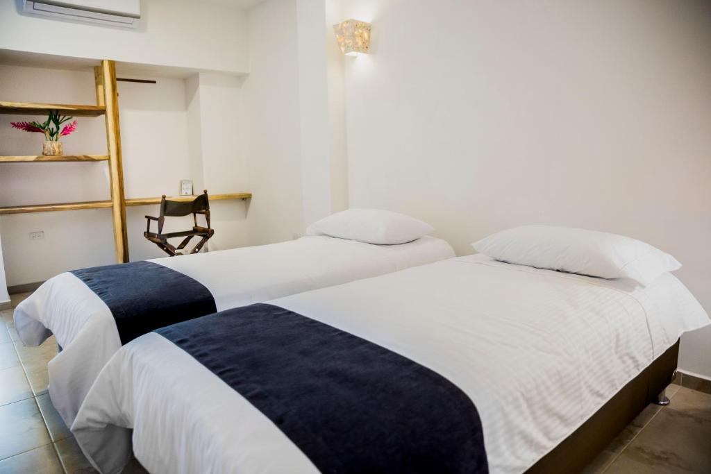 Postel nebo postele na pokoji v ubytování Hotel Restaurante Selva Negra