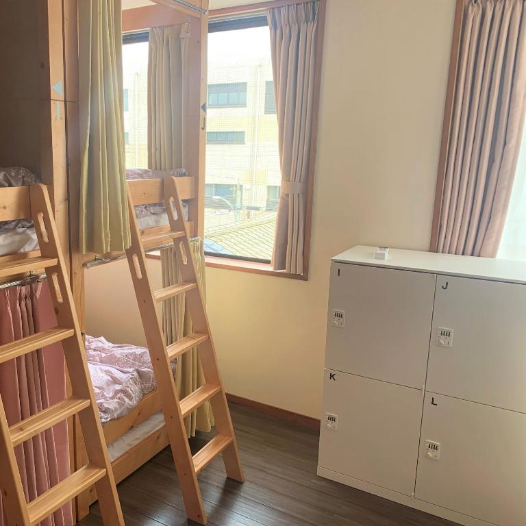 Postel nebo postele na pokoji v ubytování Guesthouse Zink