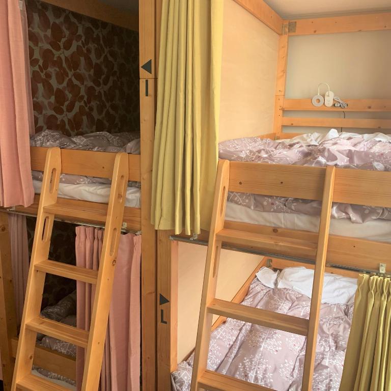 Postel nebo postele na pokoji v ubytování Guesthouse Zink