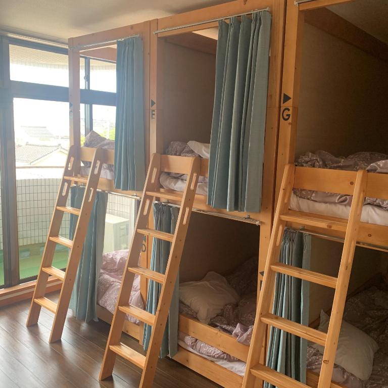 Palanda nebo palandy na pokoji v ubytování Guesthouse Zink