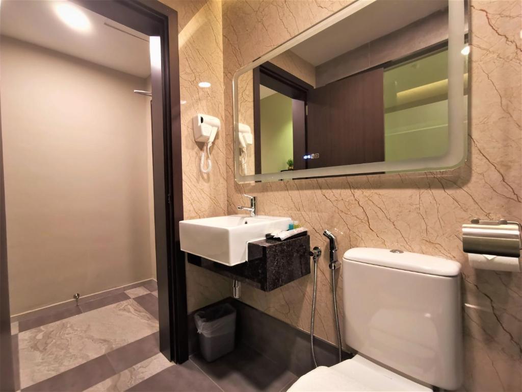 Koupelna v ubytování Prestigo Hotel - Johor Bharu