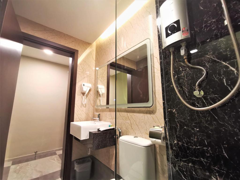 Koupelna v ubytování Prestigo Hotel - Johor Bharu