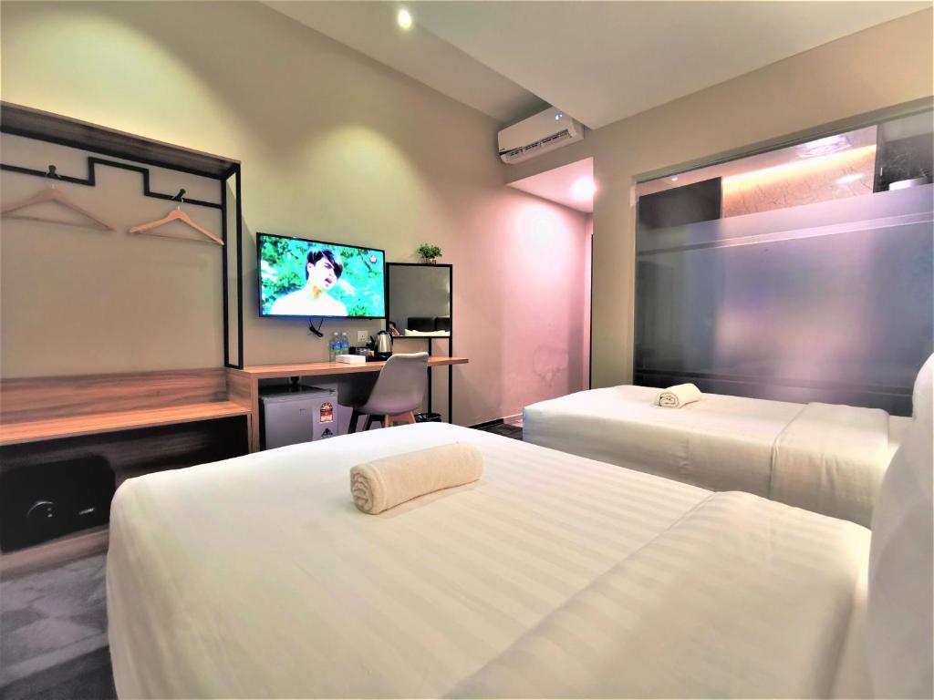 TV a/nebo společenská místnost v ubytování Prestigo Hotel - Johor Bharu