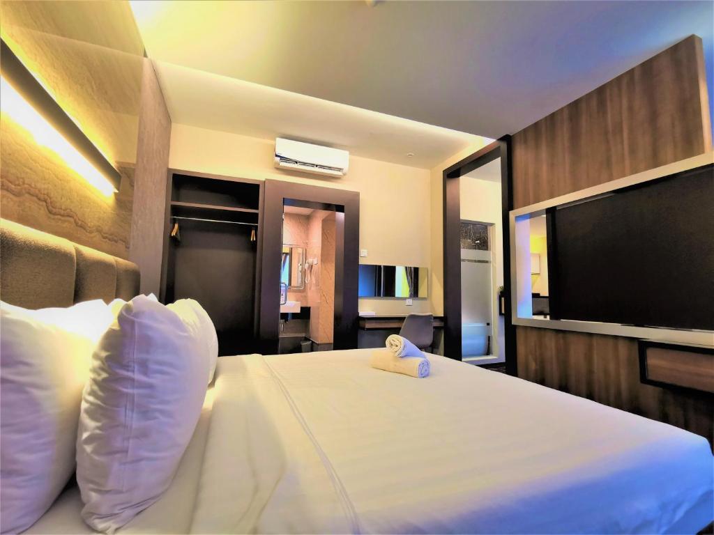 TV a/nebo společenská místnost v ubytování Prestigo Hotel - Johor Bharu