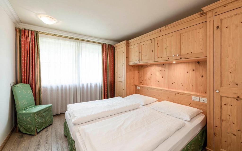 Posteľ alebo postele v izbe v ubytovaní Residence Cesa Rives