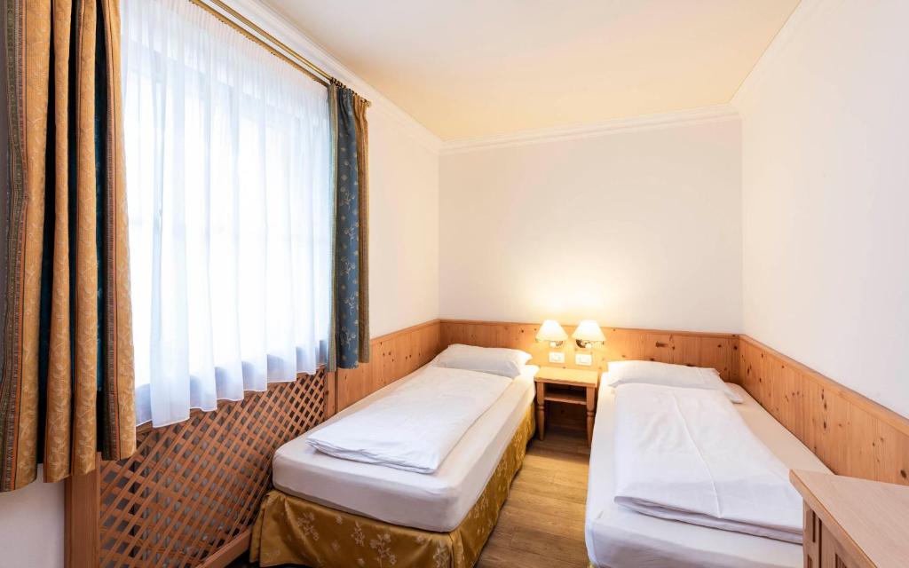 Posteľ alebo postele v izbe v ubytovaní Residence Cesa Rives