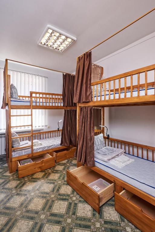 Postel nebo postele na pokoji v ubytování Хостел Perron