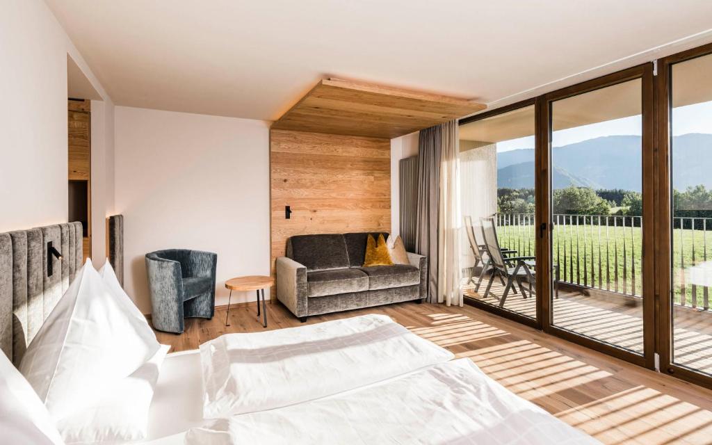 Postel nebo postele na pokoji v ubytování Hotel Olympia